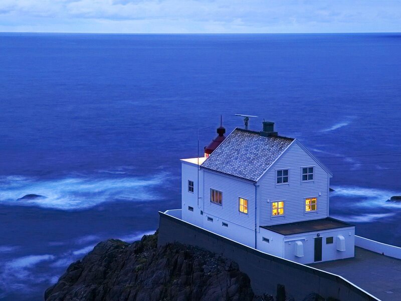 Lighthouse on Cliff — Blue, Serene, Night, Photograph, Ocean, Rocks, Sky
