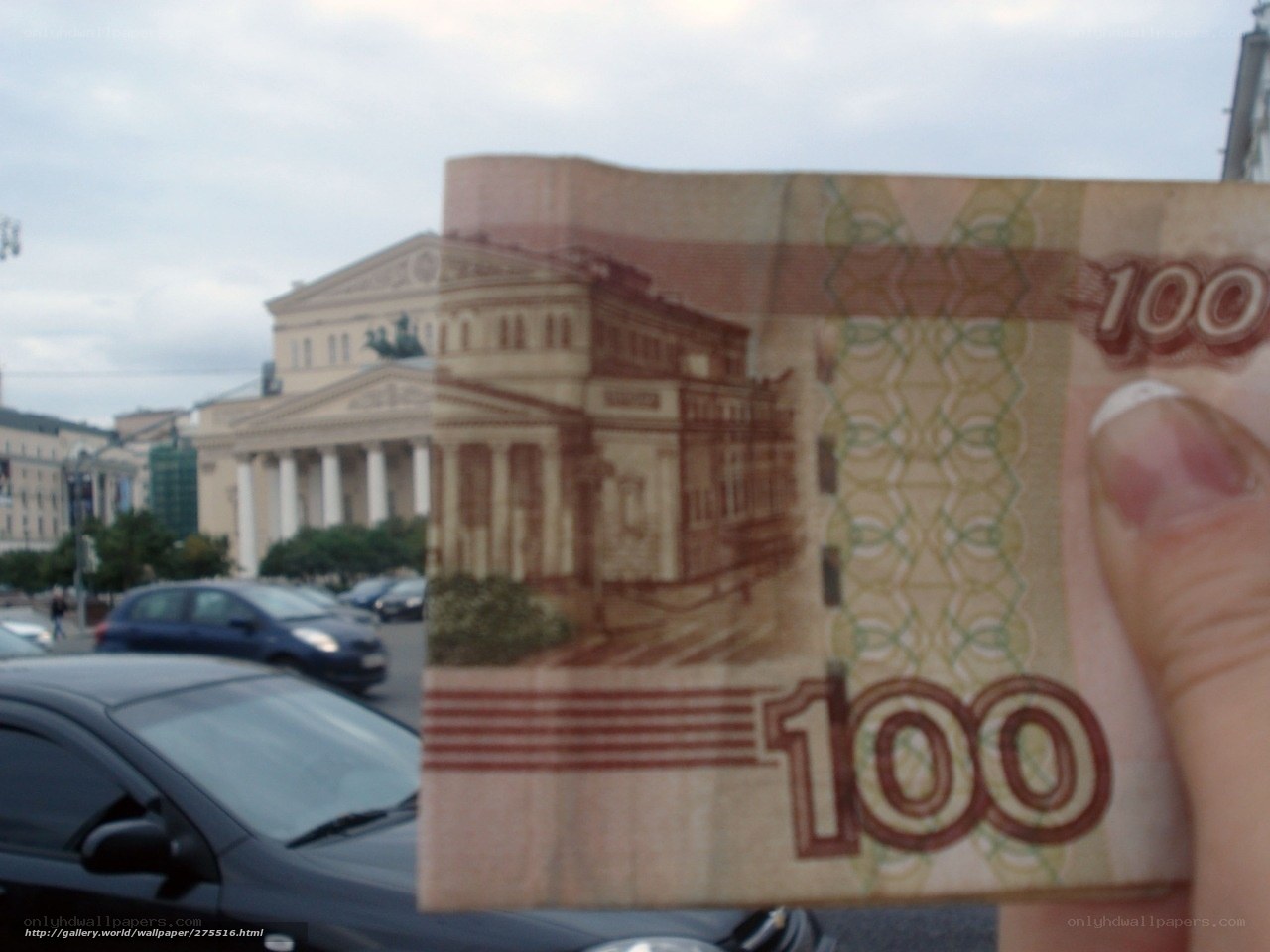 100 ruble banknote in front of building