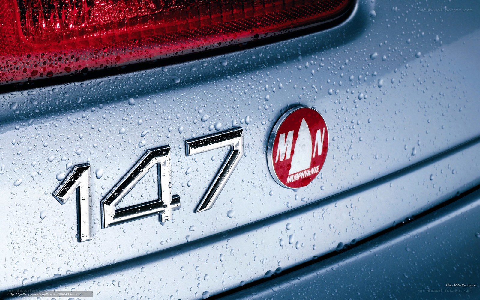147 badge on wet car