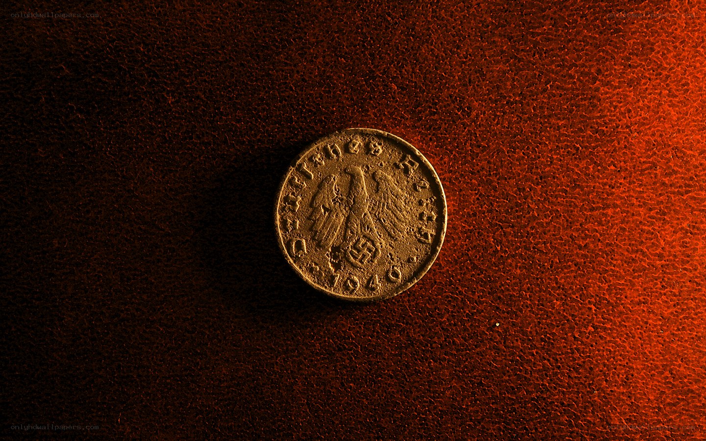 1946 German coin on red surface