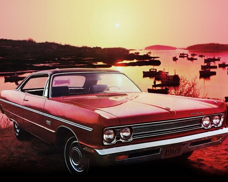 1969 Plymouth car at sunset