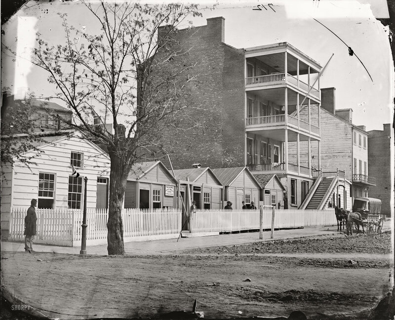 19th-century street scene with buildings