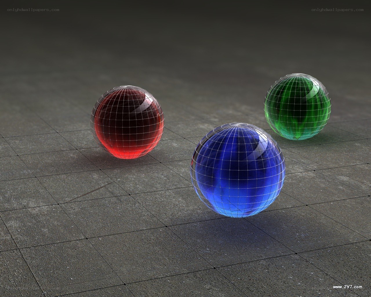 3 colored spheres on tiled floor
