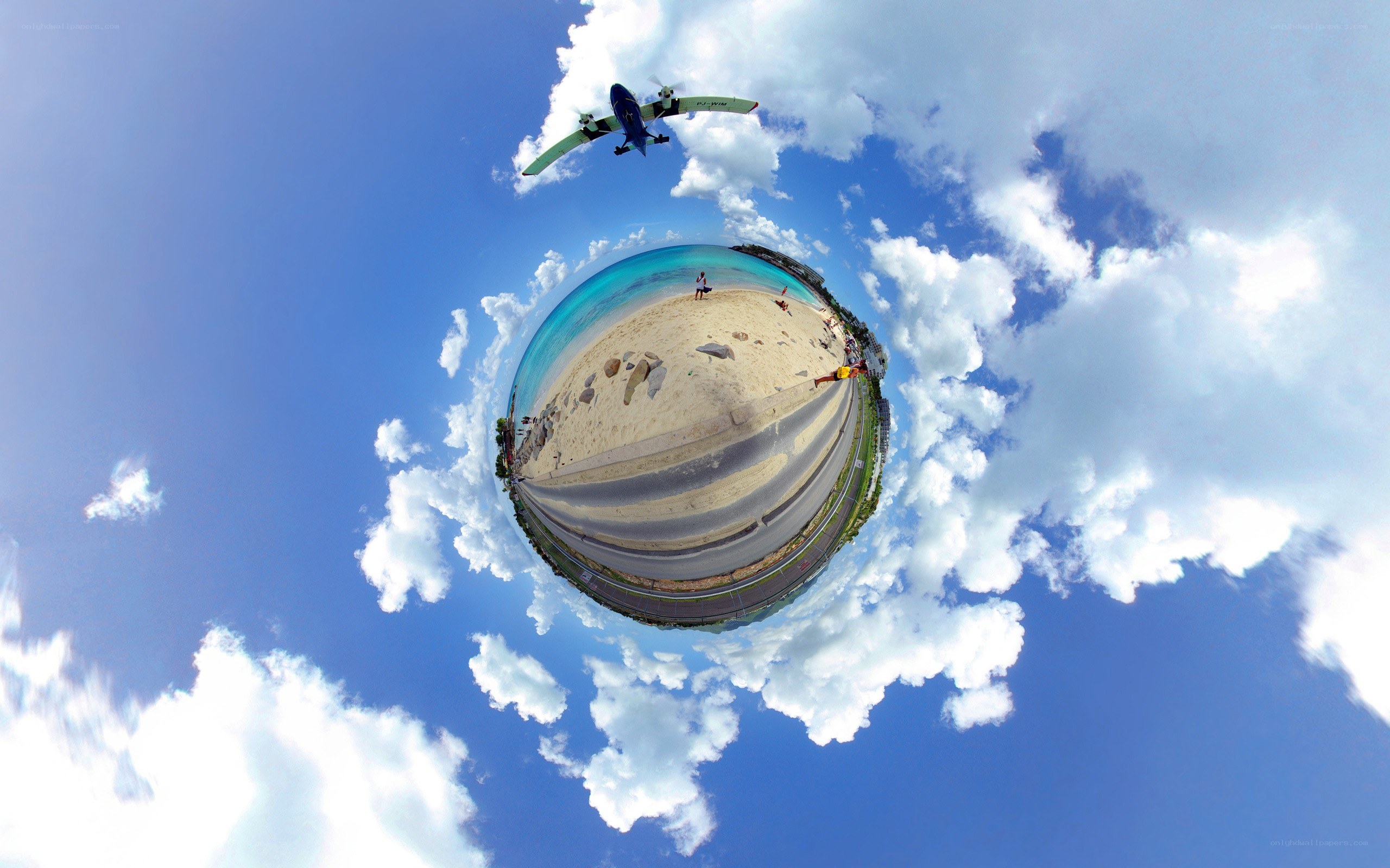 360-degree beach scene with airplane