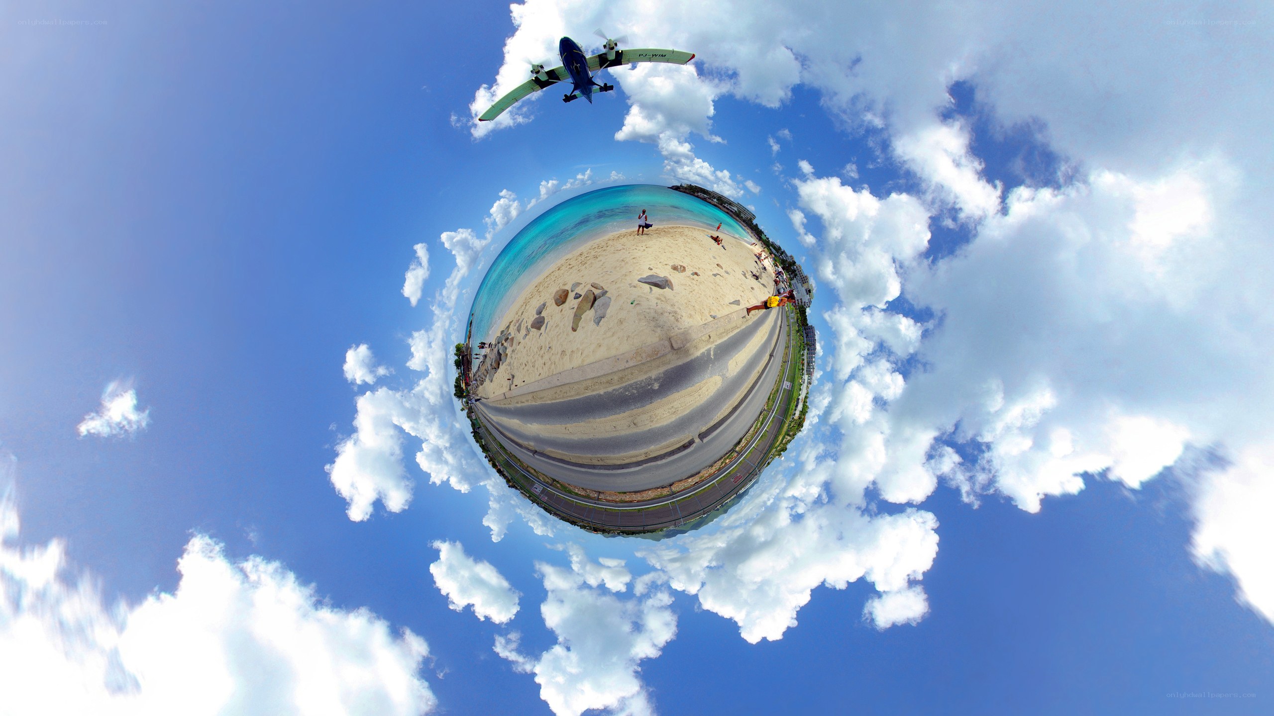 360-degree beach scene with airplane