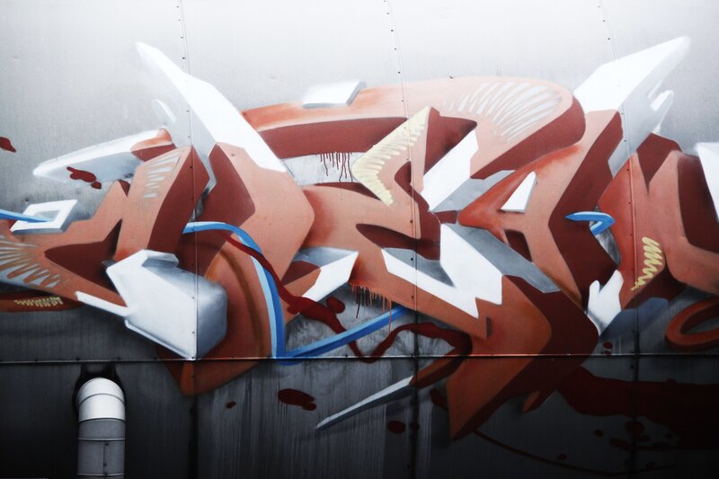 3D graffiti art on metal wall
