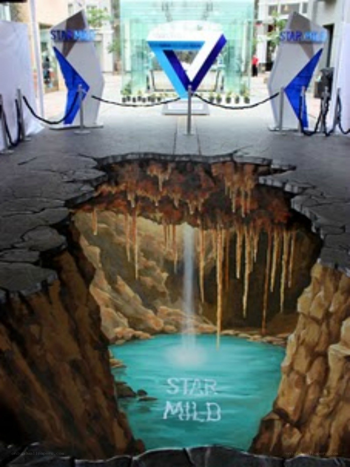 3D street art cave illusion