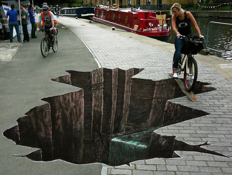 3D street art illusion of a pit