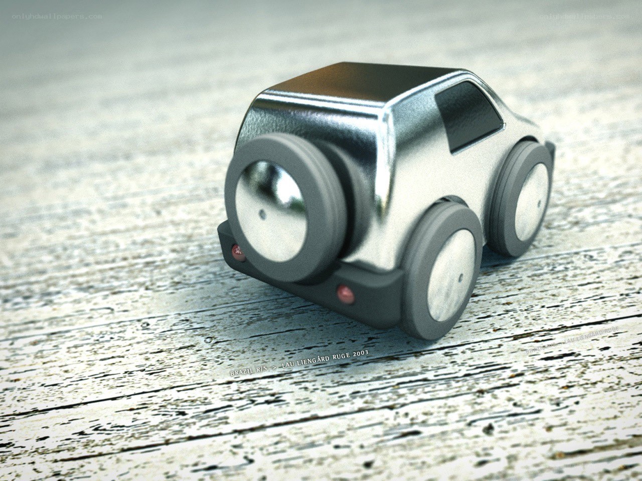 3D toy car on wooden surface