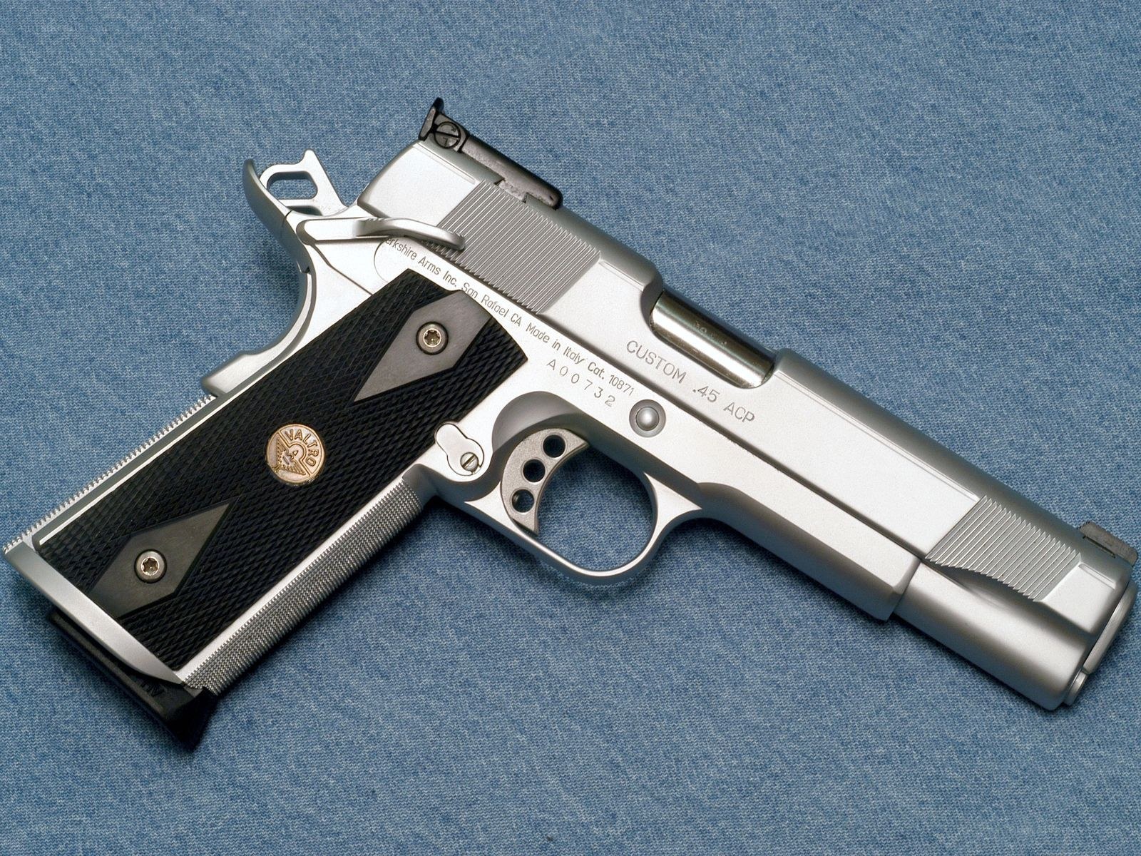 .45 ACP pistol on denim