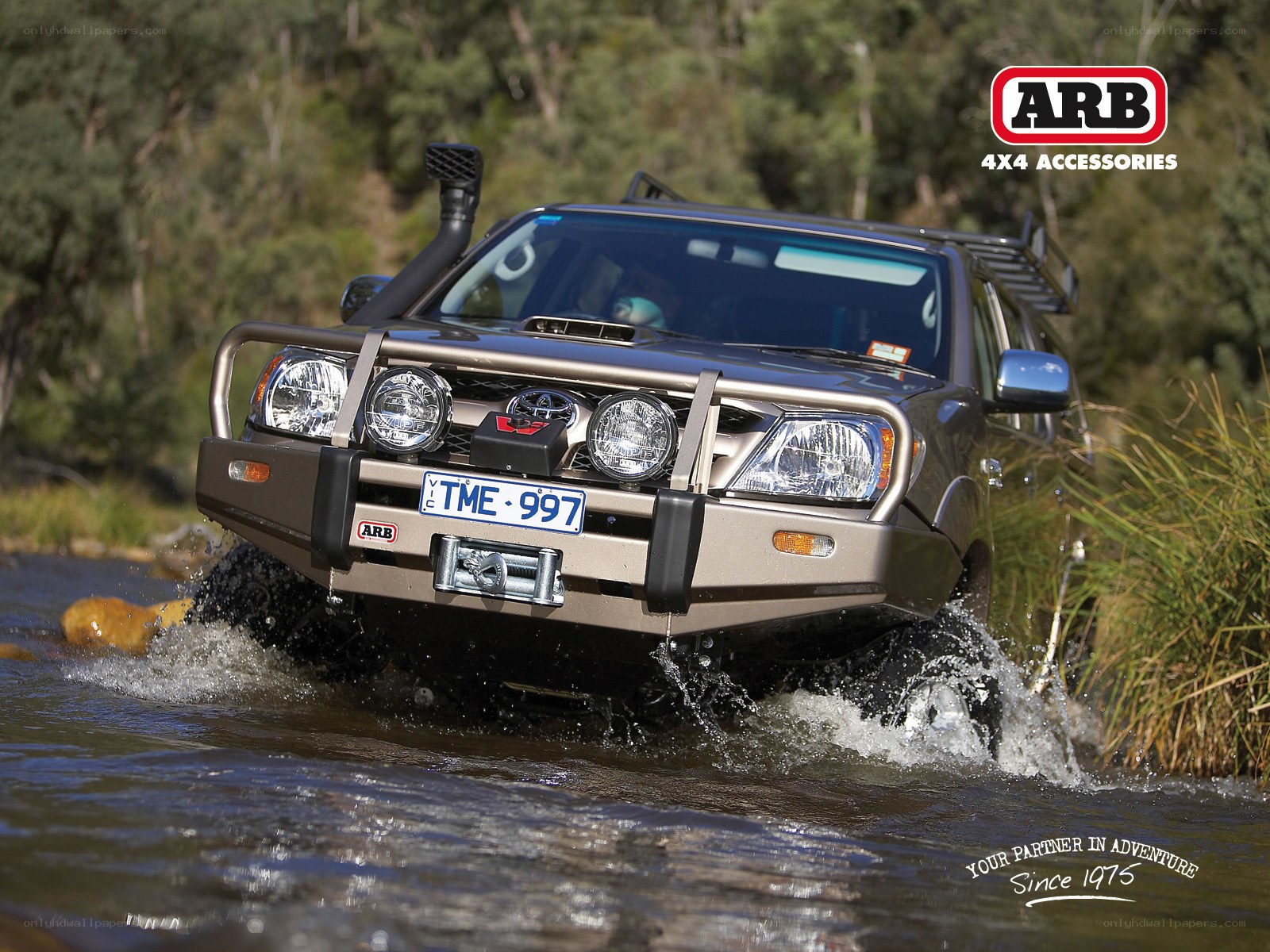 4x4 vehicle crossing river