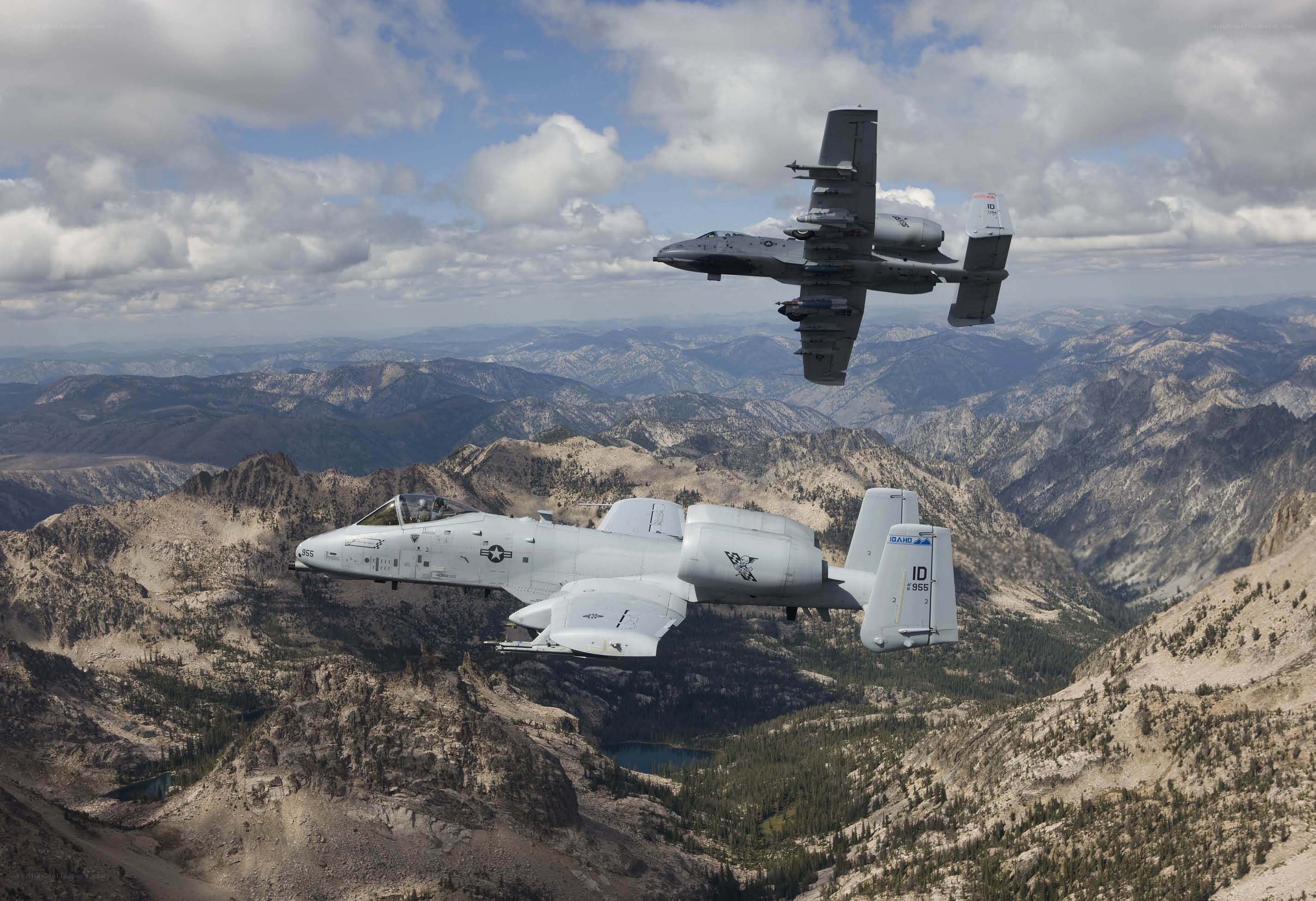 A-10 Thunderbolt II jets over mountains