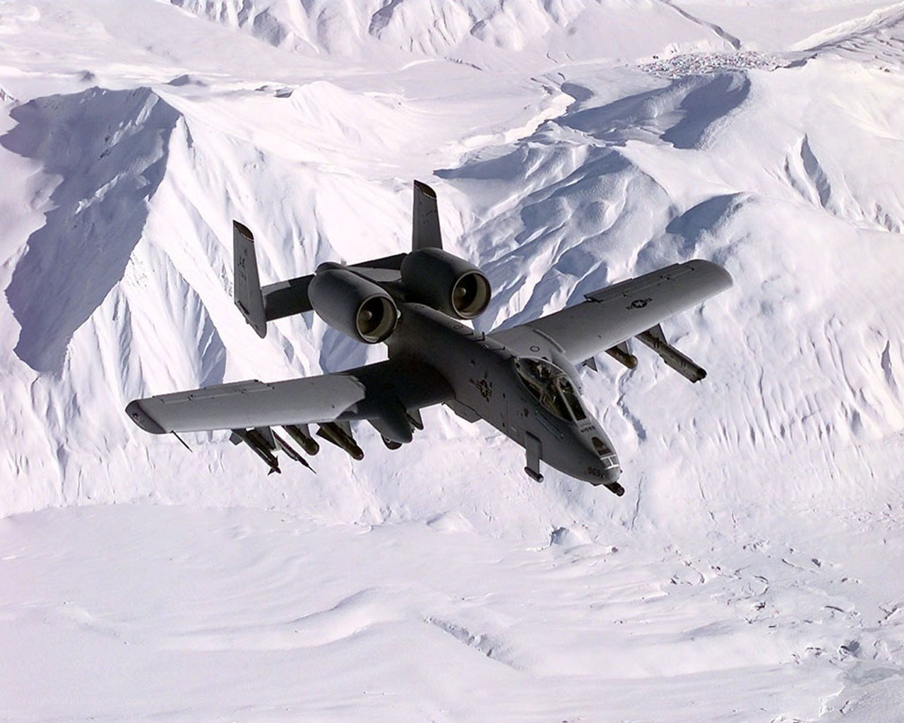 A-10 Thunderbolt II over snowy mountains