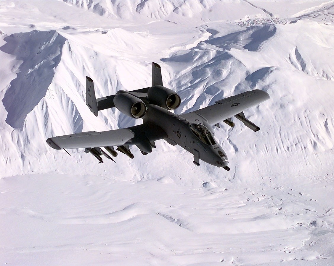 A-10 Thunderbolt II over snowy mountains