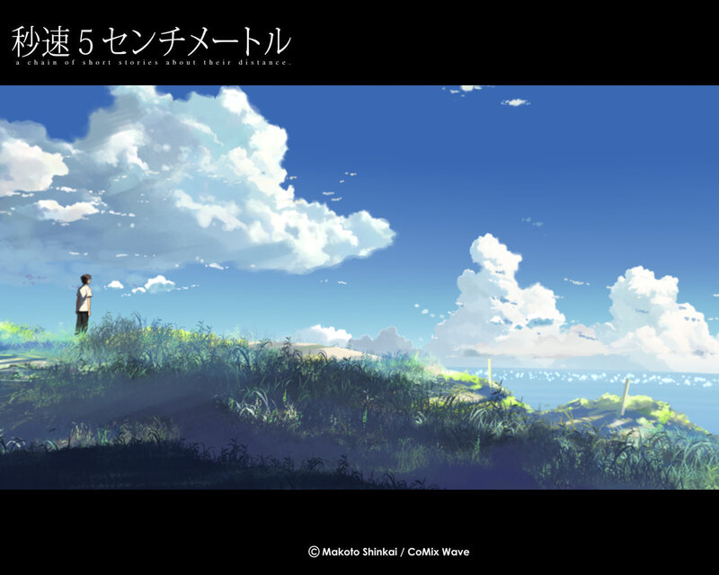 A boy on a hill by the sea