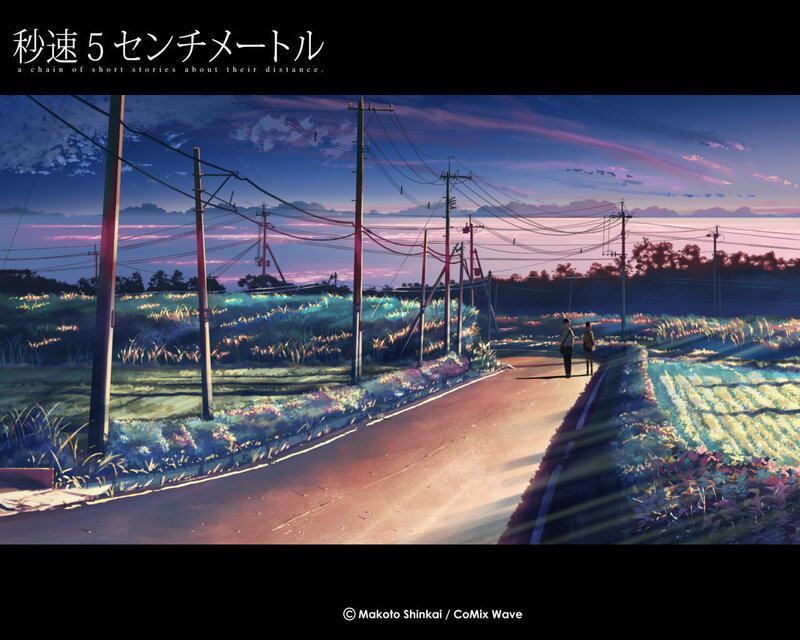 A couple walks a rural road at dusk