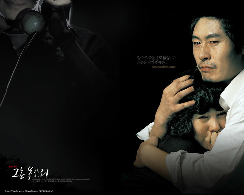 A man holds a crying woman