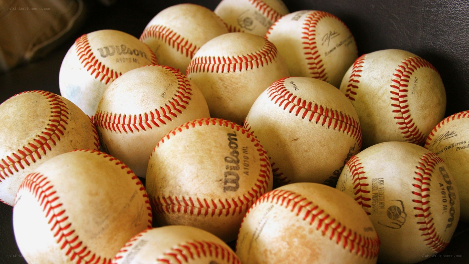 a pile of baseballs