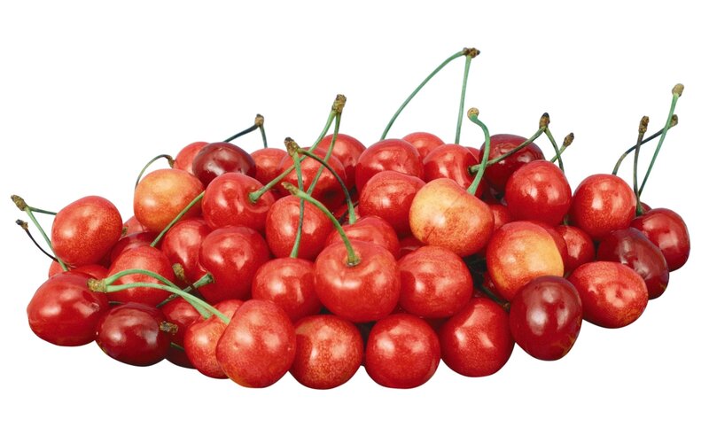 a pile of fresh cherries