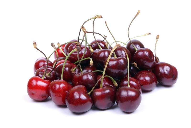 a pile of fresh cherries
