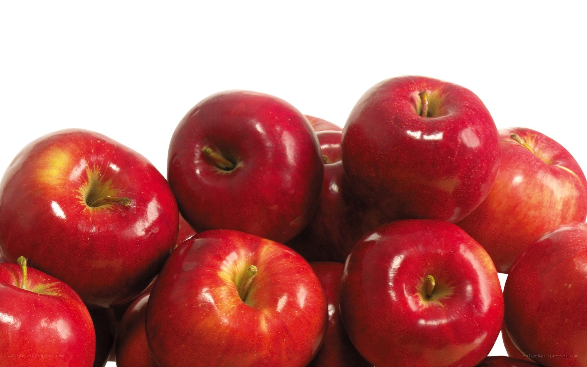 a pile of red apples