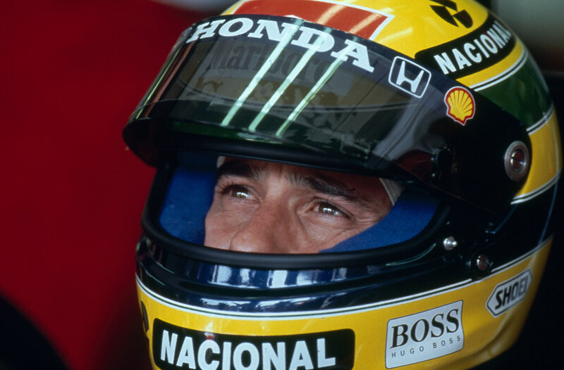 A racing driver in a helmet