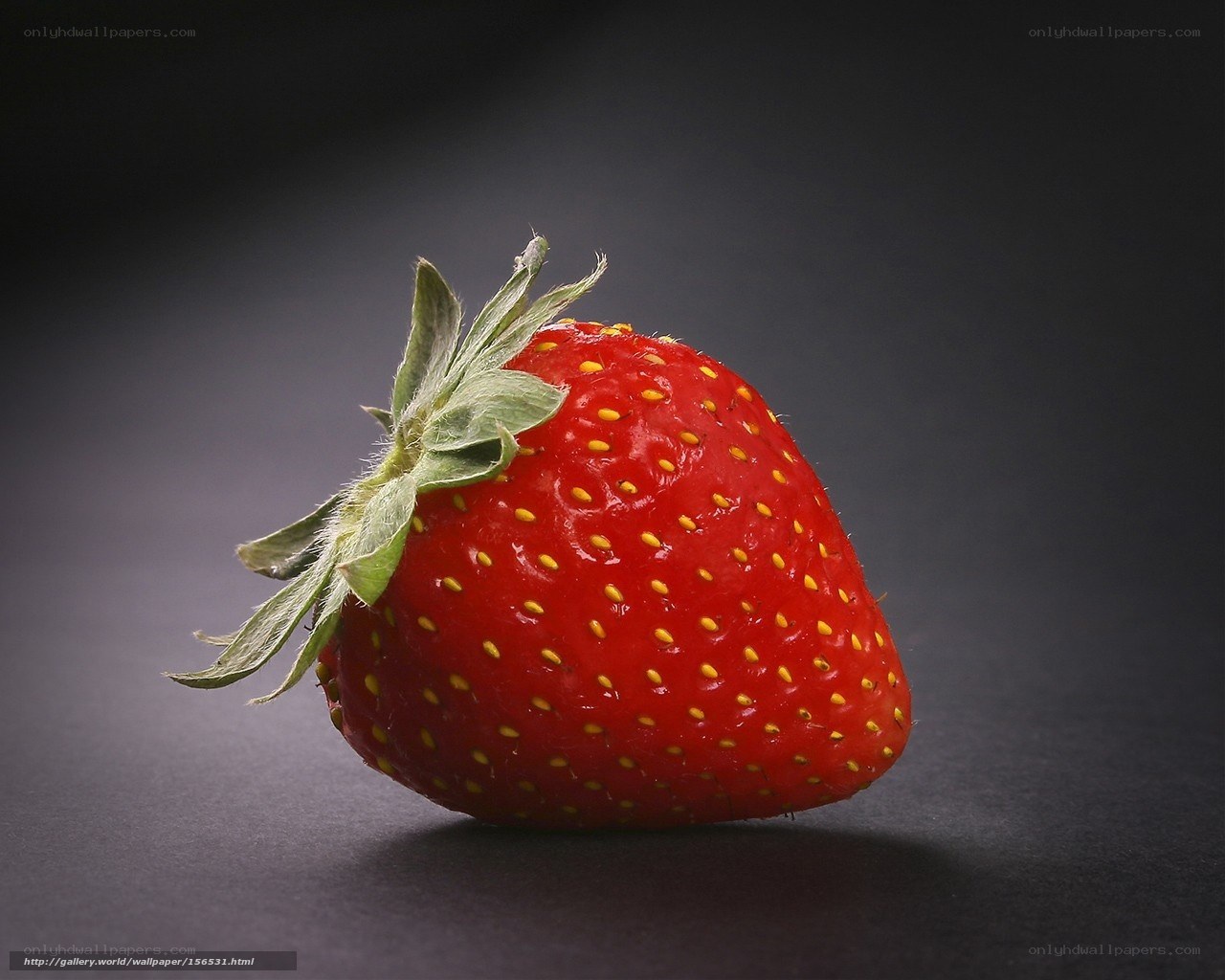 A single ripe strawberry