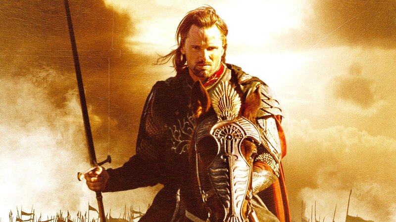 A warrior stands with sword