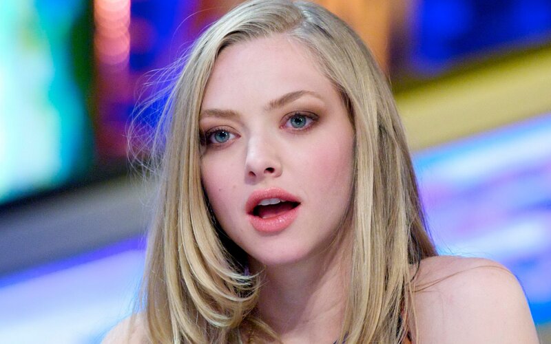 A woman with blonde hair and blue eyes