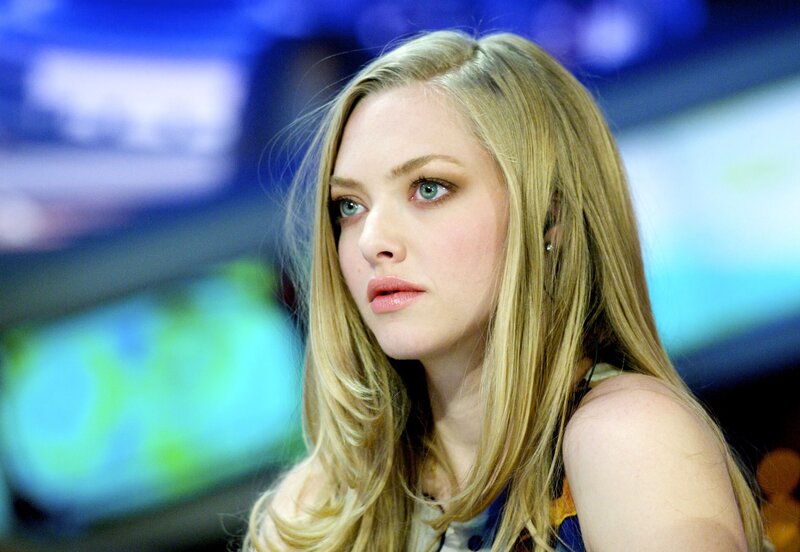 A woman with blonde hair and blue eyes