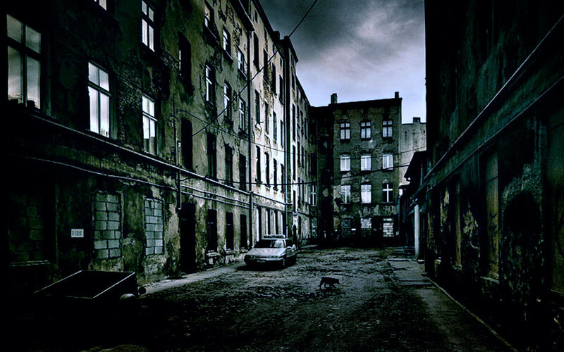 abandoned alley with old buildings