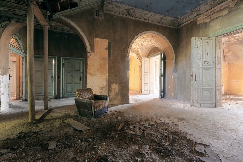 Abandoned Armchair in Hall