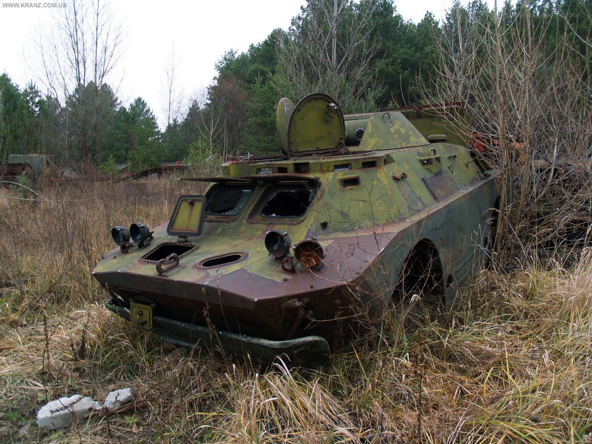 Abandoned armored vehicle in field