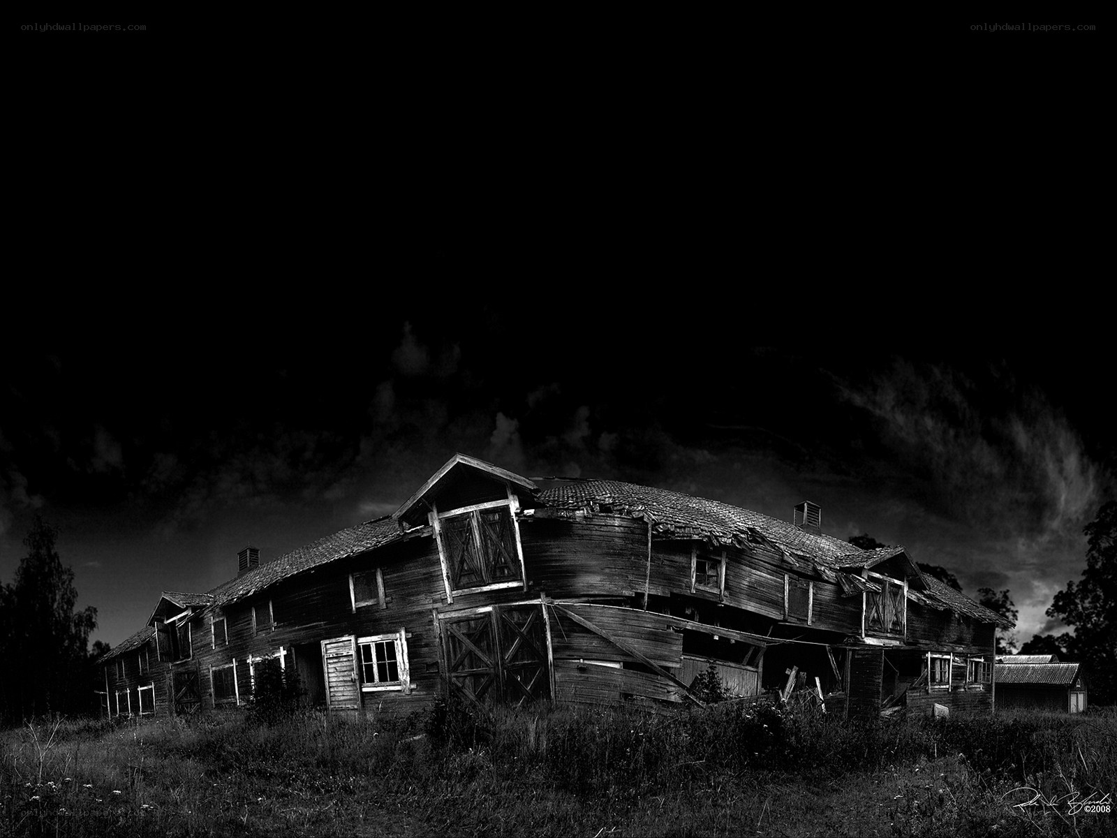 Abandoned barn at night