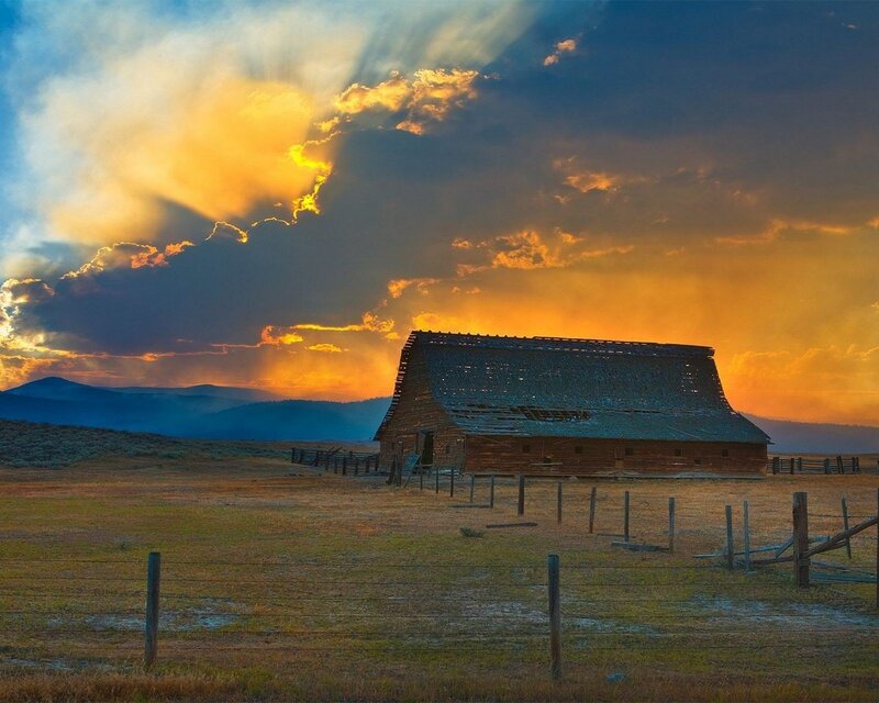 Abandoned Barn at Sunset — Orange, Dramatic, Photograph, Mountains, Fence, Clouds, Blue