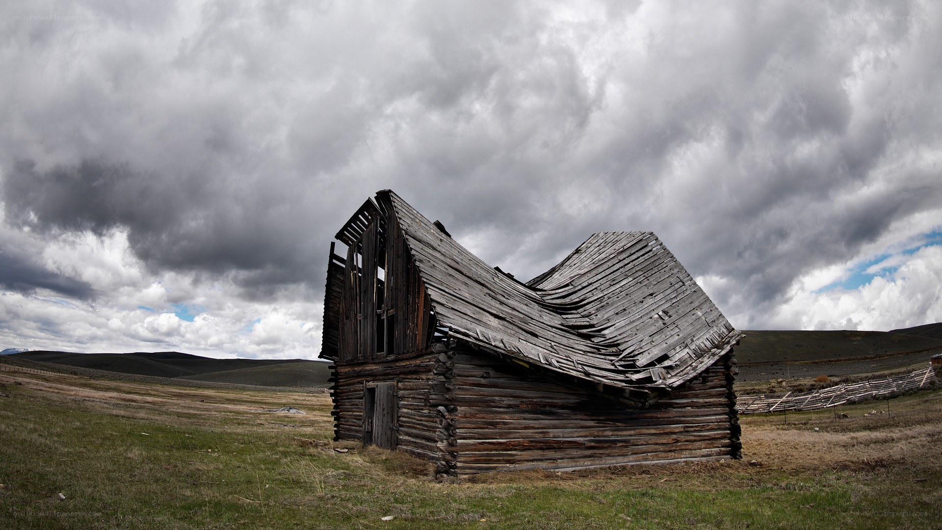 Abandoned barn in a field