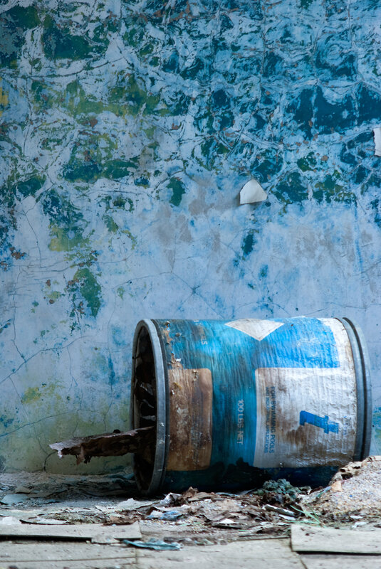abandoned barrel in decayed room