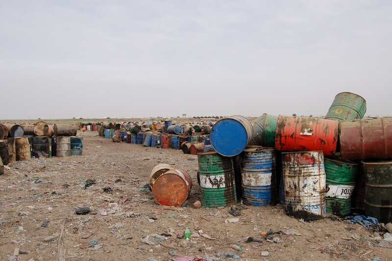 Abandoned barrels at a dump site