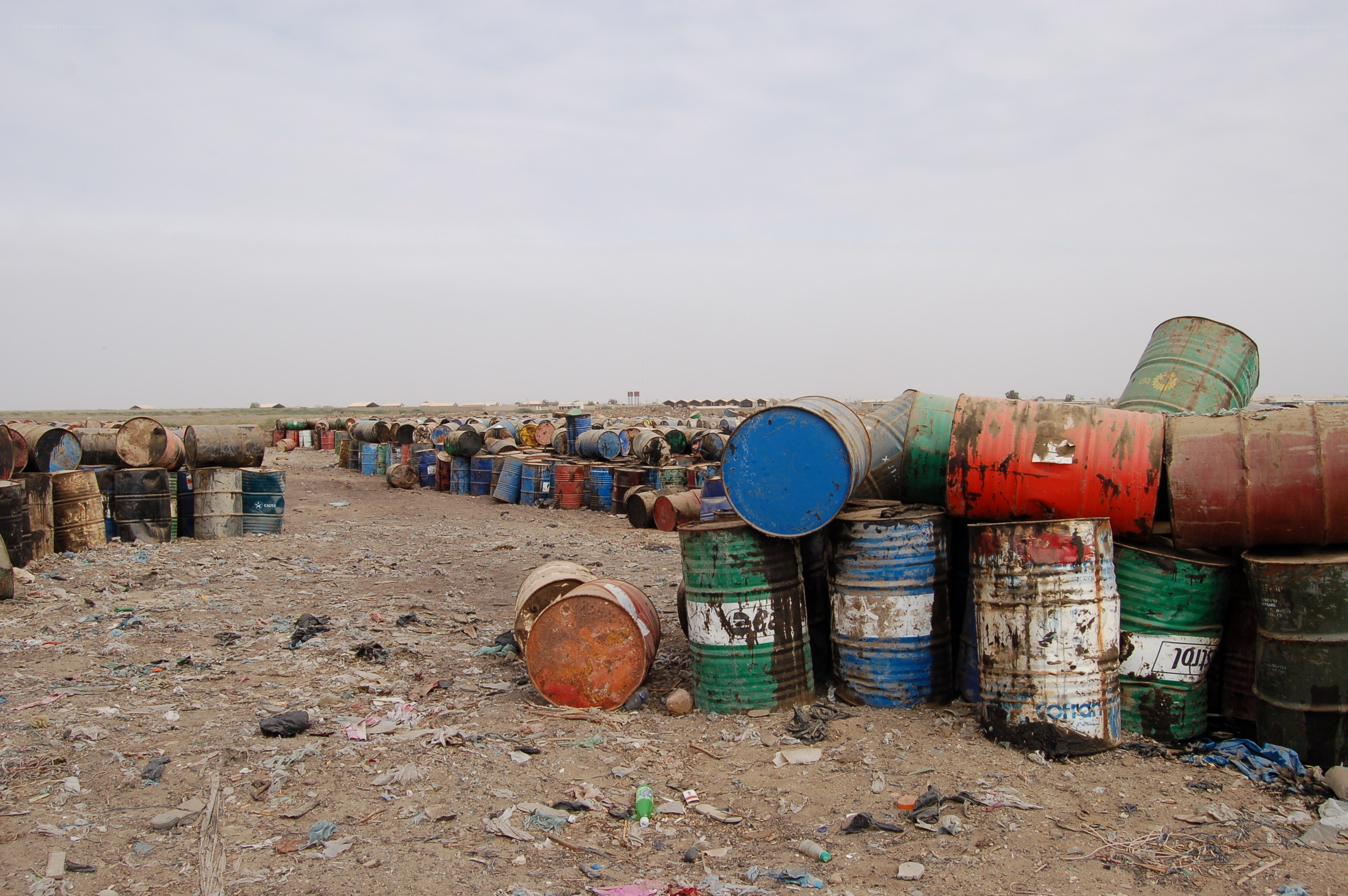 Abandoned barrels at a dump site