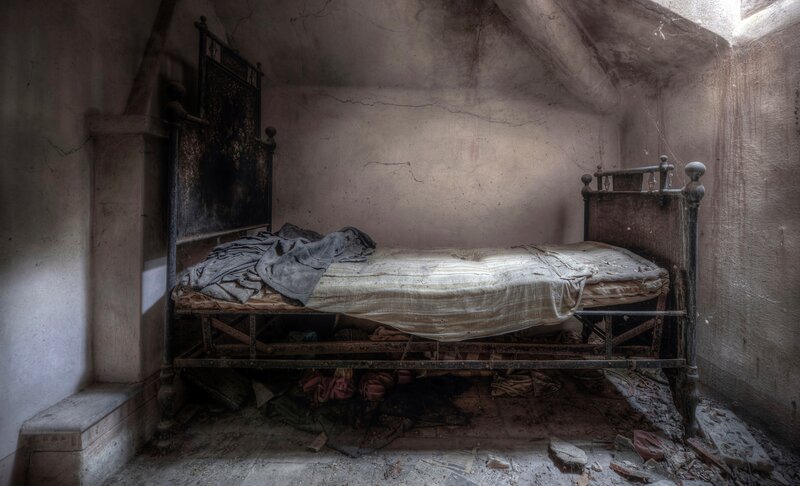 Abandoned Bed in Room