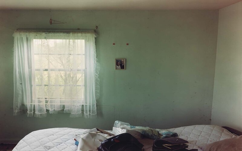 abandoned bedroom with window