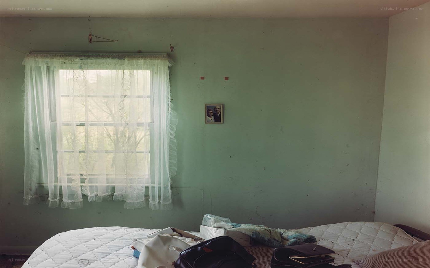 abandoned bedroom with window