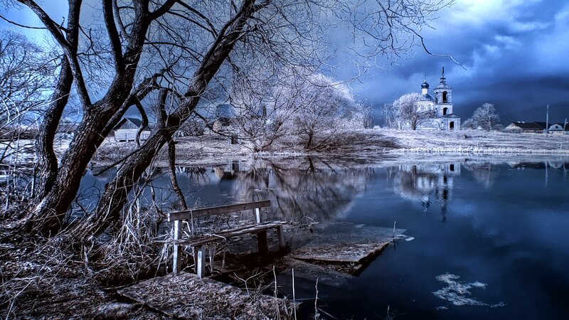Abandoned Bench by River