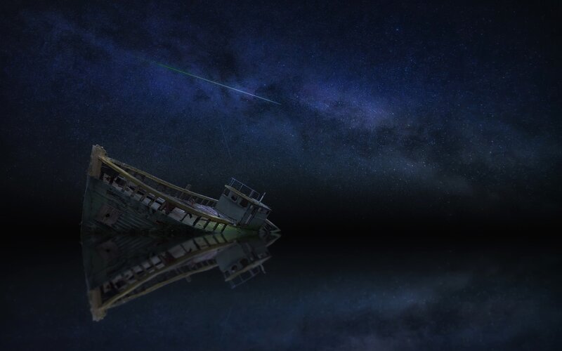 Abandoned Boat at Night