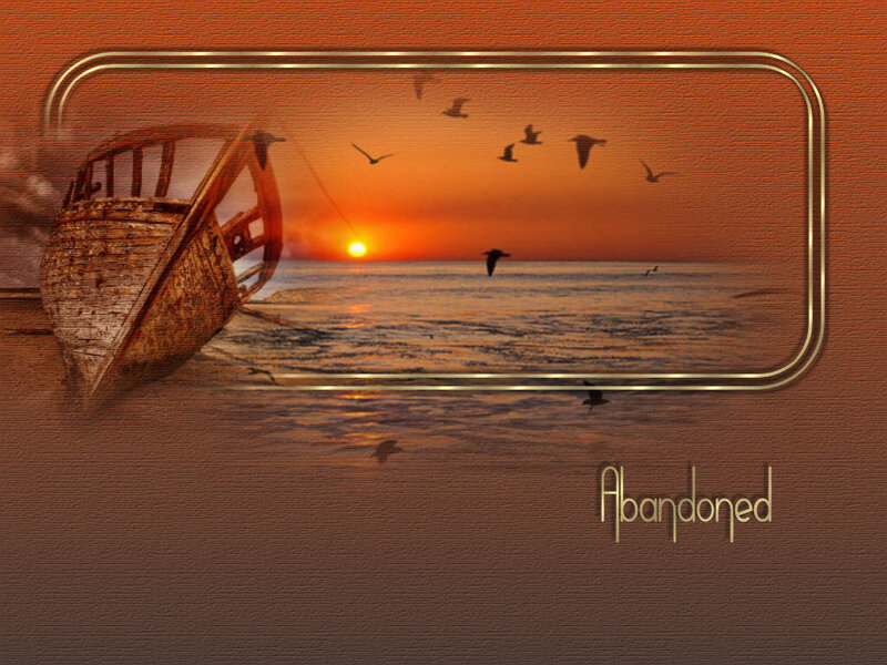 Abandoned boat at sunset