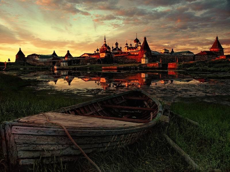 Abandoned Boat at Sunset — Orange