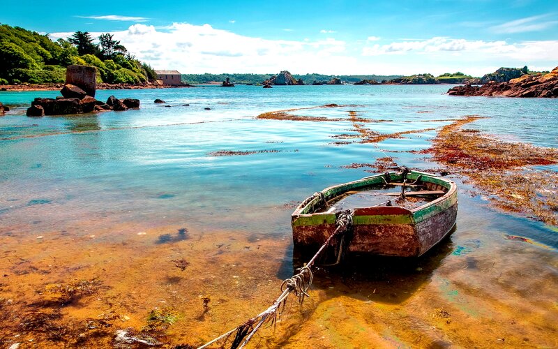 Abandoned Boat in Bay