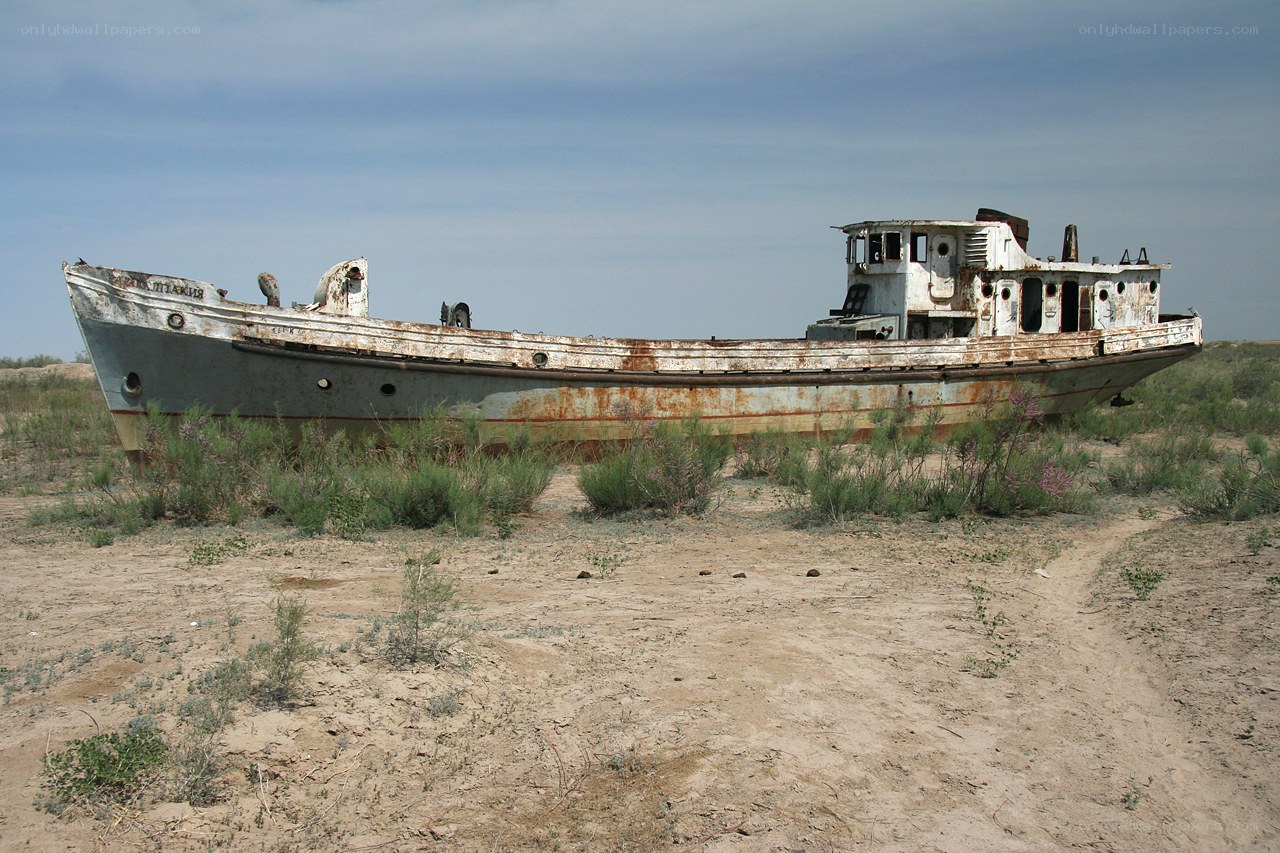 abandoned boat in desert