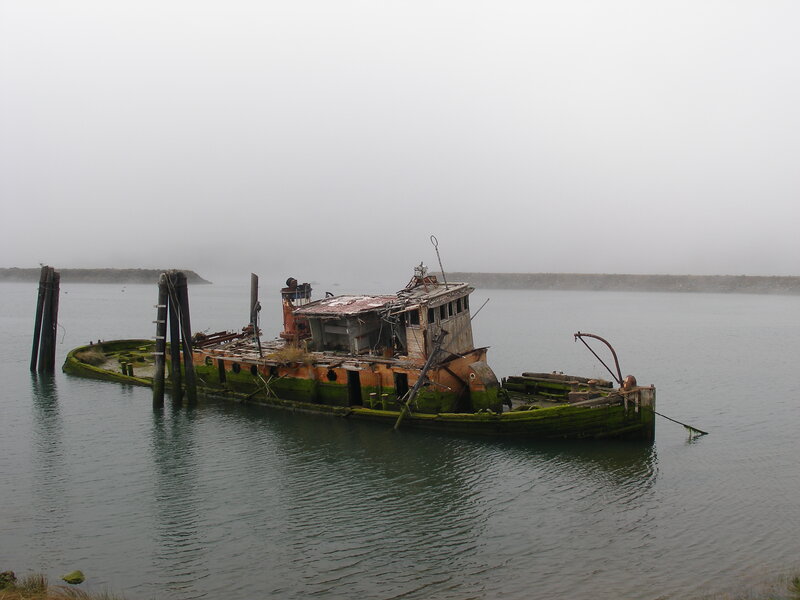 Abandoned Boat in Water