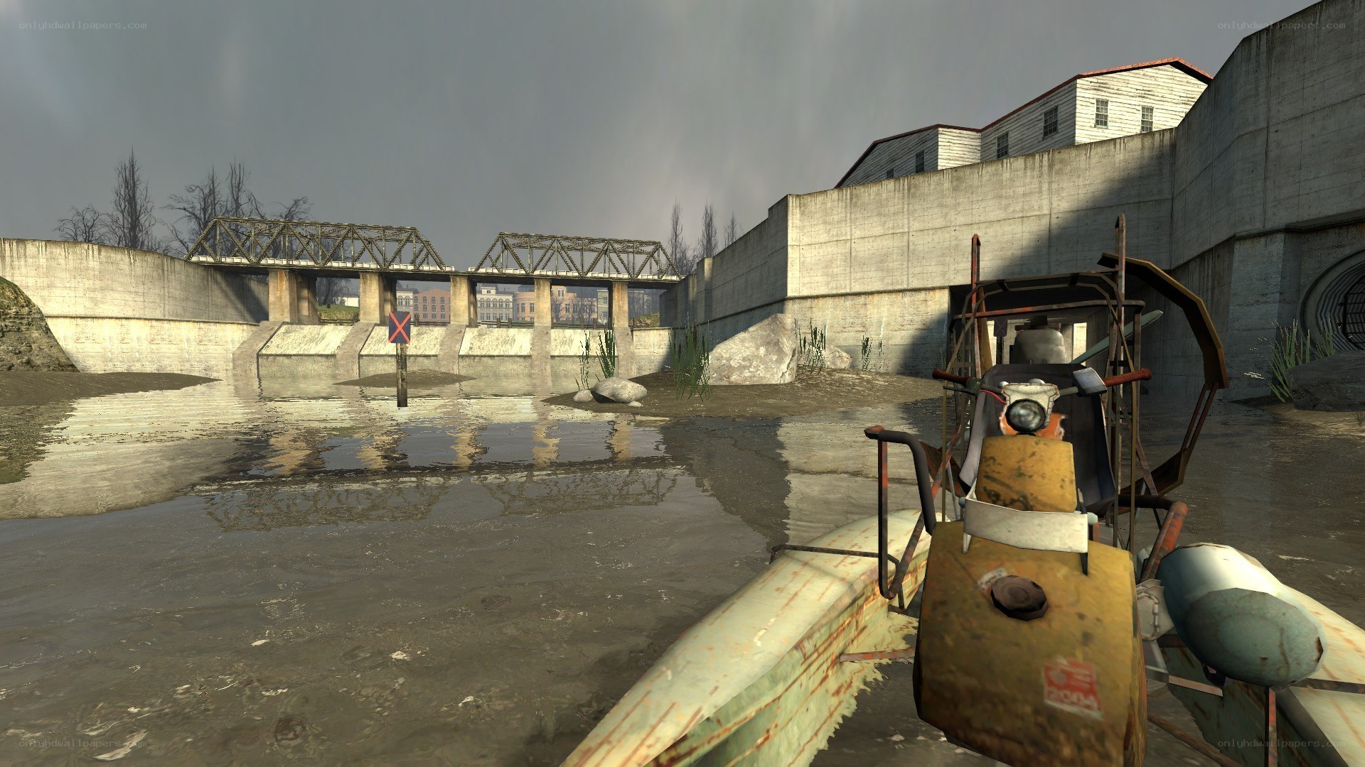 abandoned boat near bridge